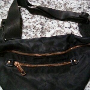 a . New day black Fanny Pack
